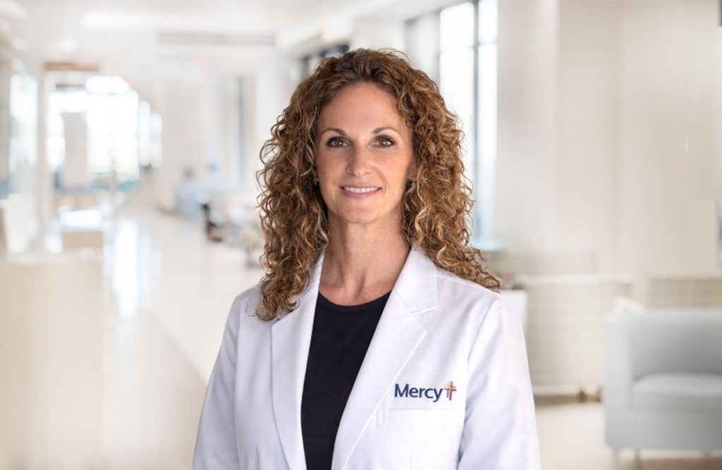 Head shot of Tawnya Peery, APRN-CNP, in a white lab coat.