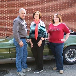 Together, Courtney Allen (far right) and her parents lost more than 250 pounds.
