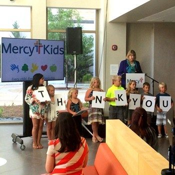Jean Gruetzemacher, vice president of Mercy Health Foundation Springfield, joins Mercy Kids to announce donation halfway mark.
