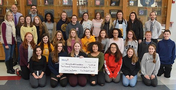 Fox High School Student Council members and their sponsor David Pliemann presented a check for $2,391 to Mercy Health Foundation Jefferson for patients undergoing cancer treatment at Mercy Jefferson. 
