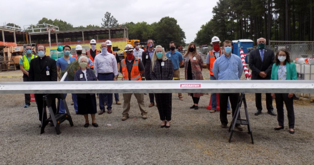 Leaders from Mercy Fort Smith, Arkansas Colleges of Health Education, Kindred Healthcare and McCarthy Building Companies signed the final beam before it was put into place at the new Mercy Fort Smith Rehabilitation, under construction at 6700 Chad Colley Blvd.