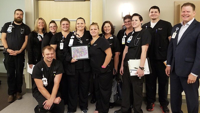 The Medical and Surgical team on the First Floor of the new Mercy Jefferson Medical Tower B celebrated Natasha's Tulip Award with her.