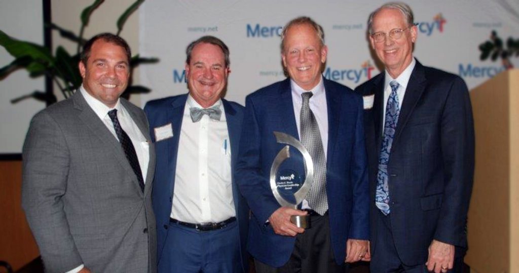 Stephen Mackin, Mercy Hospital St. Louis president, Dr. Richard Pennell, Mercy Hospital St. Louis medical staff president and chief of vascular surgery, Dr. William Logan, recipient of the 2018 Thoele Award, and Dr. Paul Hintze, Mercy Hospital St. Louis chief medical officer.