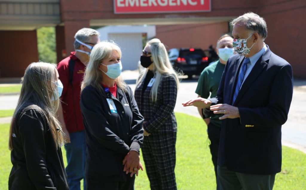 Arkansas Sen. John Boozman, right, speaks with Sheila Nix, left, and Kim Russell at Mercy Hospital Waldron on Aug. 18.