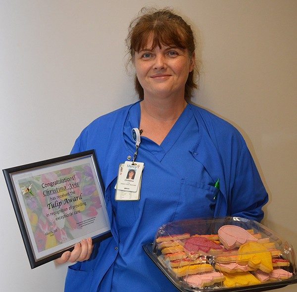 Christina Avis purchased food and collected clothing for a patient in need. 