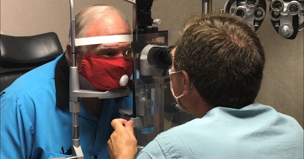 Don Smith gets a follow-up eye exam from Dr. Wendell Scott, Mercy ophthalmologist.