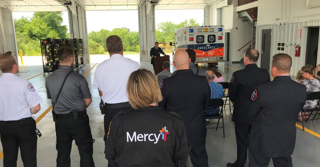 Emergency crews and community members gather for the blessing and ribbon cutting to celebrate the new EMS space inside the Fair Grove Fire Protection District.