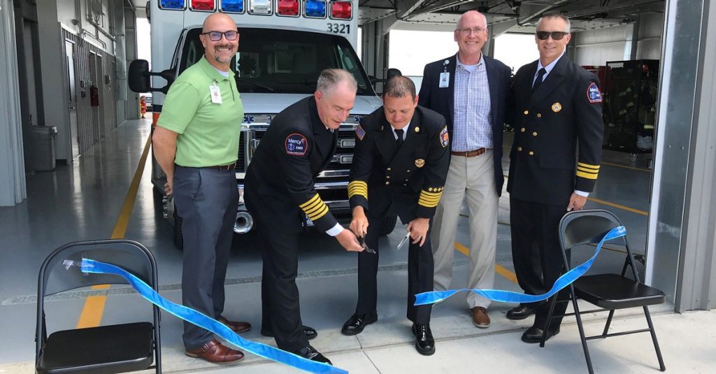 Officials from Mercy and the Fair Grove Fire Protection District cut the ribbon on the area of the new fire headquarters that will house a Mercy ambulance and full-time EMS crew. From left: Erik Frederick, Mercy Hospital Springfield chief administrative officer; Bob Patterson, executive director of Mercy EMS Springfield Communities; Chief Erich Higgins, Fair Grove Fire Protection District; Bill Hennessey, vice president of Mission, Mercy Springfield Communities, and Dr. Tom Lewis, medical director for Mercy EMS.