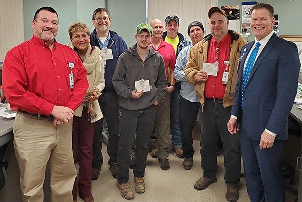 The Facilities Management team received their new four-star badge reels.