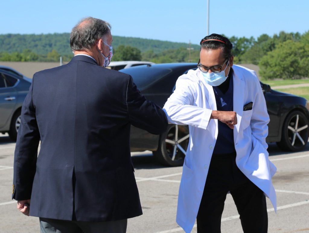 Dr. Syed Hamid, right, bumps elbows with Sen. John Boozman during Boozman's visit to Mercy Hospital Booneville on Aug. 18.