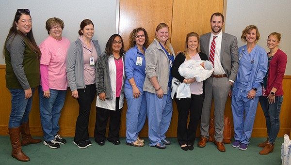 The Schomer family and members of the Mercy Childbirth Center Jefferson team along with Dr. Melinda Auer.