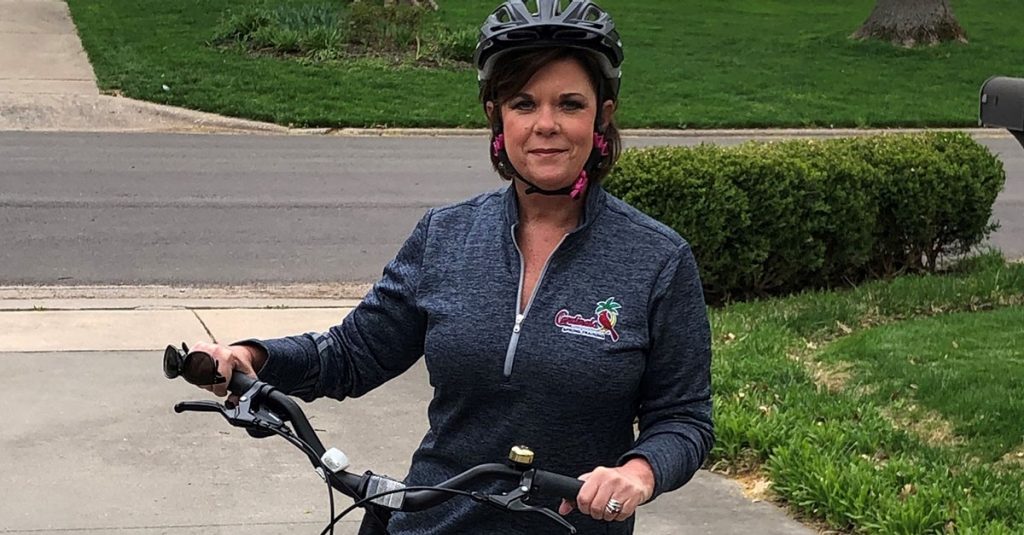 Keli McDonough on her bike after having both knees replaced at Mercy Orthopedic Hospital Springfield.