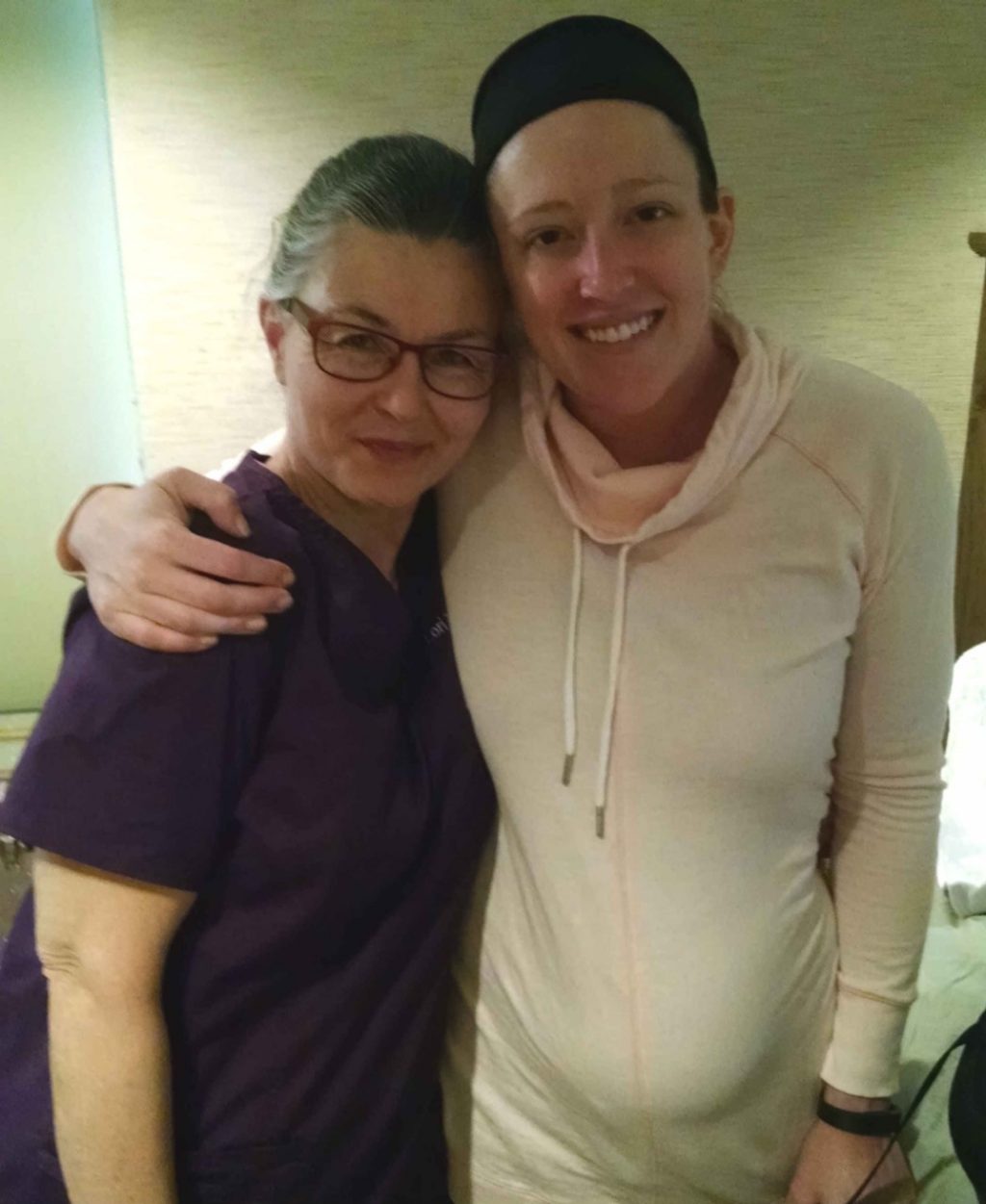 Lori Link, certified nurse midwife, with Caitlin Kissee as she prepared to give birth for the first time.