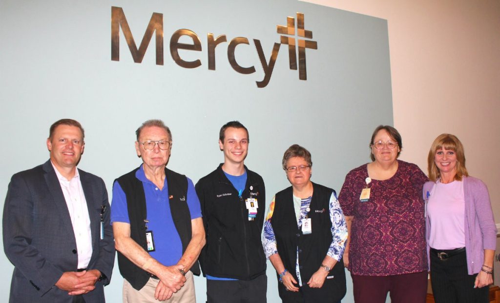 From left are Ryan Gehrig, hospital president; volunteers Richard Summers, Ryan Keefer, Becky Brotherton and Milda Gogulis; and Jenni Powell, manager of volunteers and gift shops.