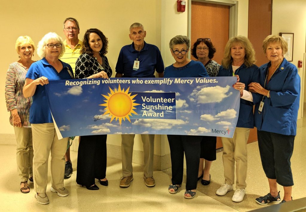 Howard Goetze, volunteer (pictured front row, 3rd from left)