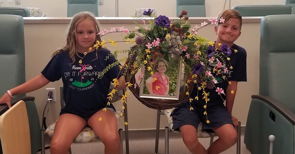 Natalie and Nathan Lynch, children of Travis and Anita Lynch, representing Team Anita at the oncology infusion center blessing and dedication.