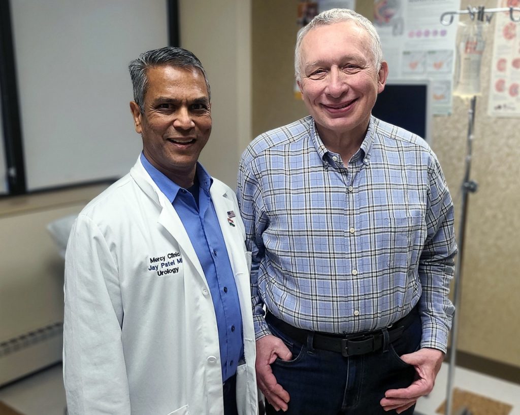 Dr. Jay Patel and Alex Sheftel during a follow up visit after Sheftel underwent an Aquablation procedure to treat benign prostatic hyperplasia.