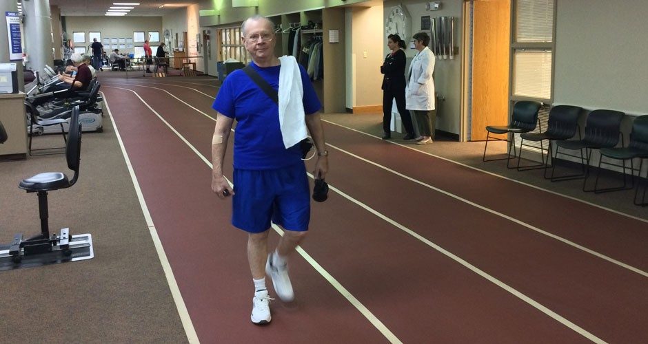 Now equipped with an LVAD, Bill Besore works out several times each week at Mercy Cardiopulmonary Rehabilitation, walking and lifting weights.