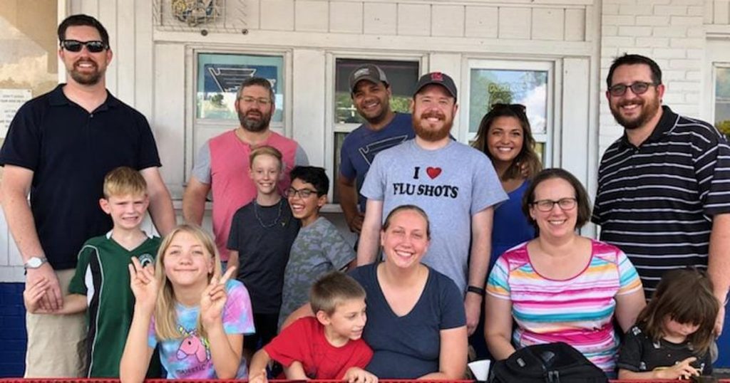 Charlie Hinderliter (in the I HEART FLU SHOTS shirt) with family and friends after they all got them together. 