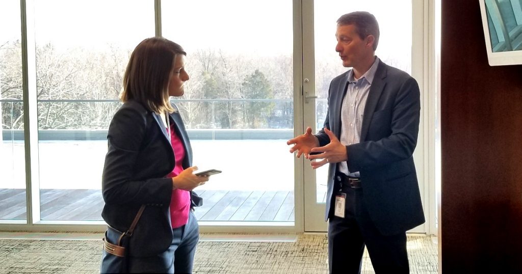 Paige Winfield Cunningham, health policy reporter with the Washington Post, speaks with Mercy Virtual President Dr. Gavin Helton during a recent tour of the Mercy Virtual Care Center.