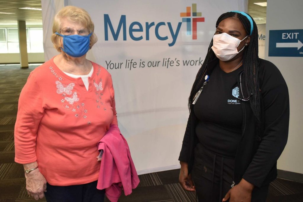 Erika Gerkens (left) and Kay Holmes (right) reunited at the Mercy COVID Vaccine Clinic - Kirkwood when Gerkens returned to receive her second vaccine dose.