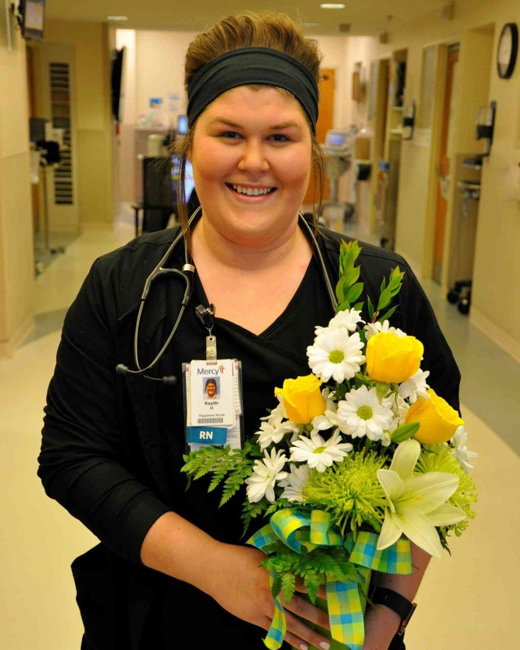 Kaytln Harpole, RN, emergency department, earning a DAISY Award for the extraordinary, compassionate and skillful nursing care she provides at Mercy Hospital South.