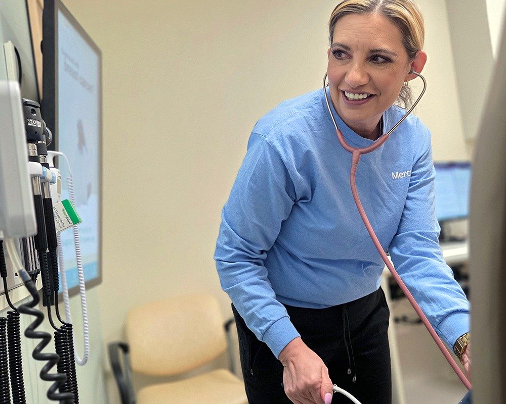 Nurse taking patient's blood pressure