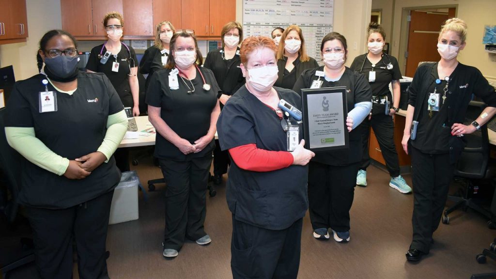 Some of the co-workers with 5 East (General Surgery) at Mercy Hospital South who earned the DAISY Team Award for the extraordinary, compassionate and skillful nursing care they provide.