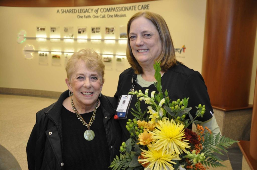 Nancy Velten (left) came back to Mercy South to honor Carol Deboard for the care she provided Velton, which earned Deboard the DAISY Award.