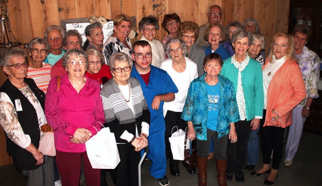 Members of the Mercy St. Francis Auxiliary gather for a group photo after their annual banquet.