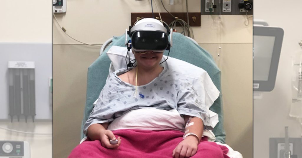 A Mercy Kids patient uses the new virtual reality headset during a recent trip to the ER.