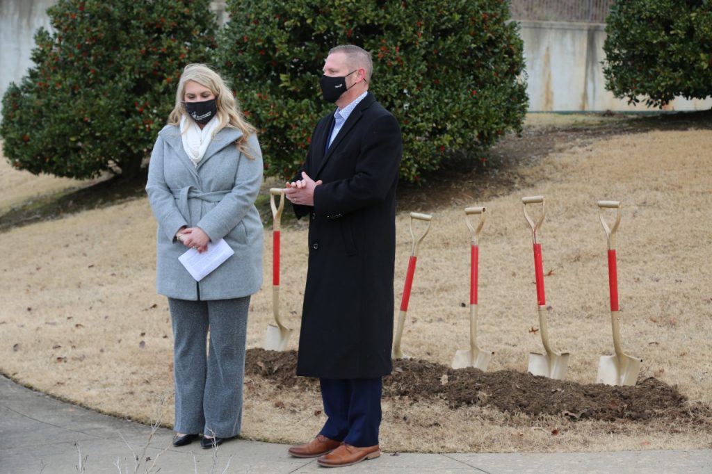 Mercy Fort Smith Hospital President Ryan Gehrig, right, speaks during the groundbreaking as Stephanie Medford, president and CEO of Ronald McDonald House Charities of Arkoma, looks on.