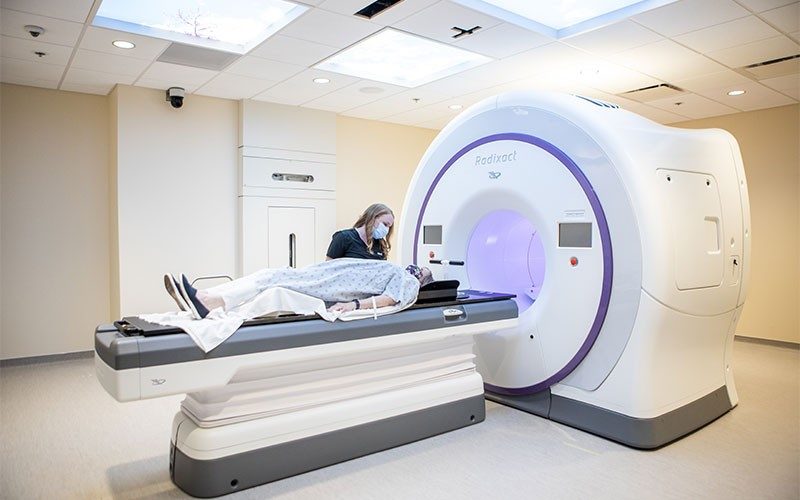 Mercy provider with patient being treated with Accuray Radixact® (with Synchrony) 