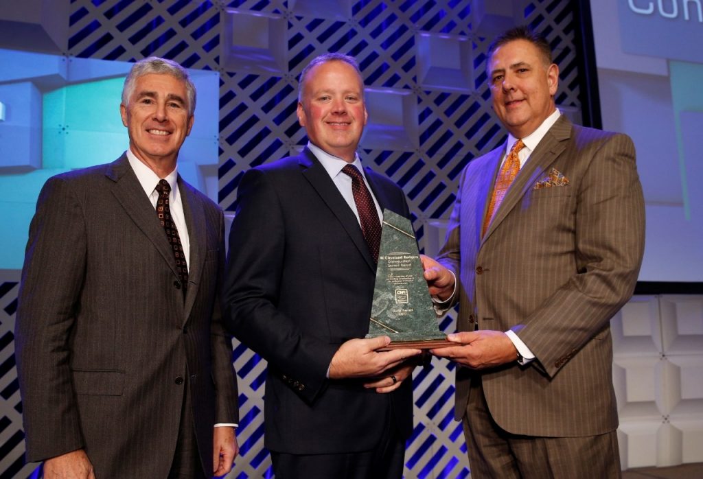 Darin Farrell (center), vice president of operations for Mercy Hospital Ardmore, received the W. Cleveland Rodgers Distinguished Service Award from Craig Jones (left), OHA president, and Jimmy Leopard, OHA board chairman and CEO of Wagoner Community Hospital.