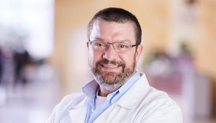 John D. Descher, FNP