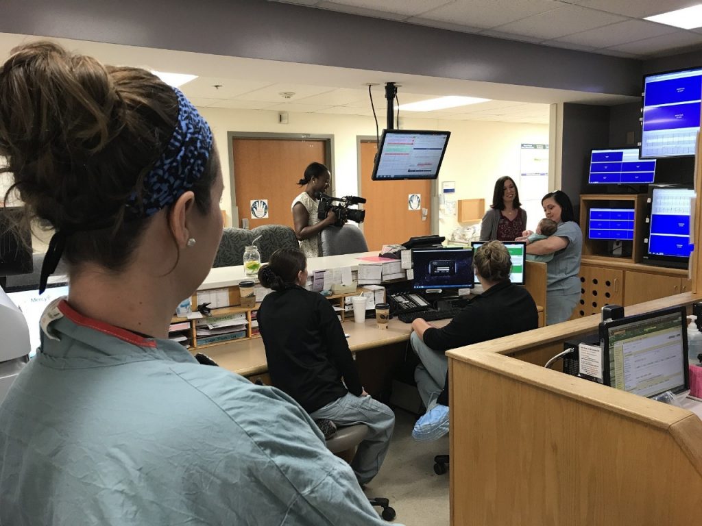 Ulm, followed by the KY3 camera, visits her colleagues.