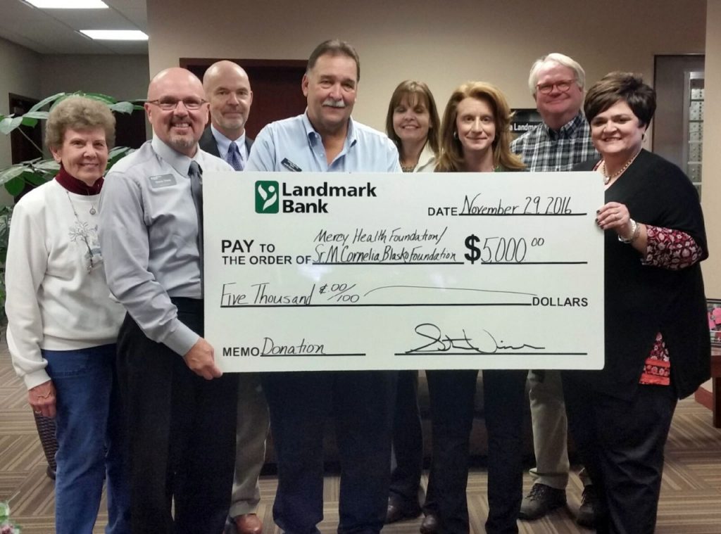 Left to right: Jane Foval, Mercy St. Francis Auxiliary president; Steve Vines, Landmark Bank regional president, southern Missouri; Charles Cantrell, Landmark Bank director; David Barnett, Mercy Health Foundation – Mountain View chairman; Cindy Bradford, Landmark Bank vice president; Cindy Tooley, Mercy St. Francis Hospital executive director of operations; Jon Smith, Landmark Bank director; and Karen Simpson-Neasby, Mercy Health Foundation vice president.