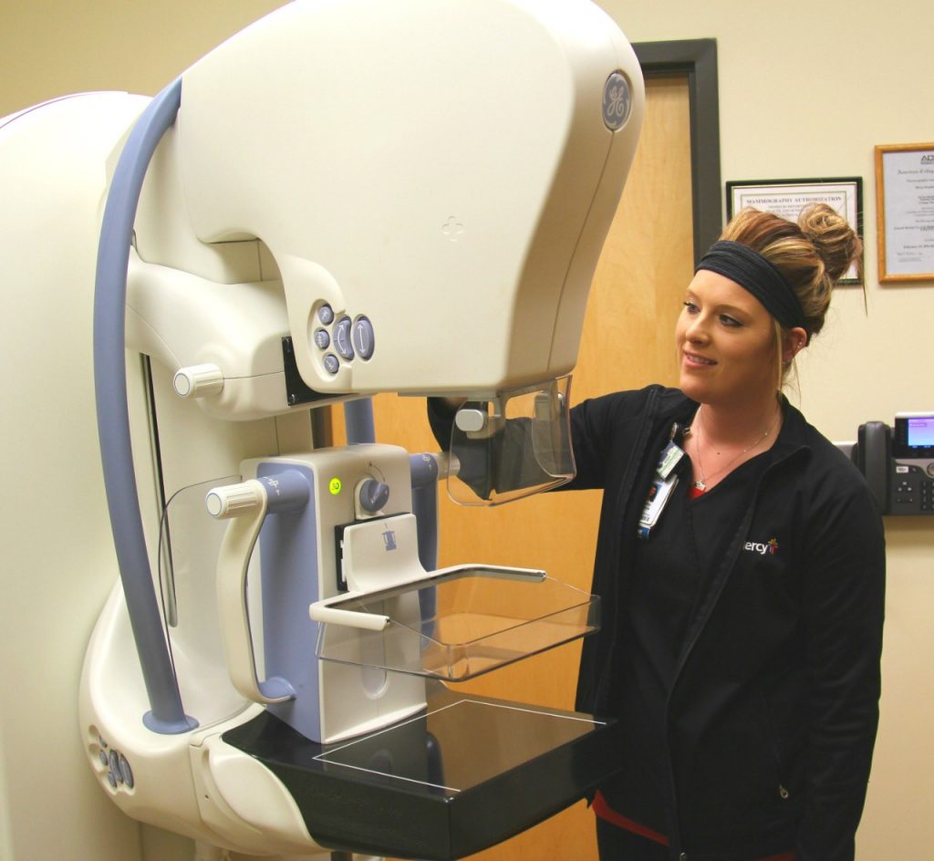 Shelby Hawkins, a registered radiologic technologist with Mercy Imaging Services – Carthage, prepares a three-dimensional mammography unit for the next patient.

