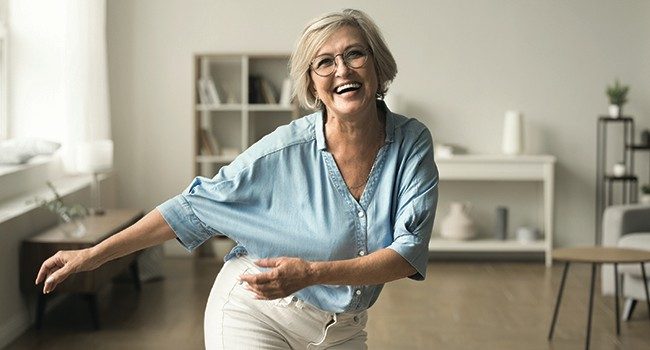 woman dancing in living room